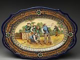 an image of a decorative plate with a painting of a group of men