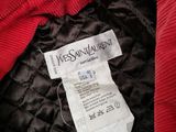 a close up of a red jacket with a label on it
