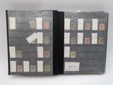 a black folder with a lot of stamps on it