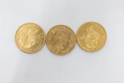 three gold sovereigns, one of which is a sovereign and one of which is a sovereign