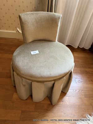 a chair that is sitting on the floor in front of a window