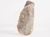 an image of a stone object on a white surface