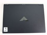 a black laptop with a mountain logo on the screen