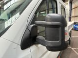 an image of a side view mirror of a van