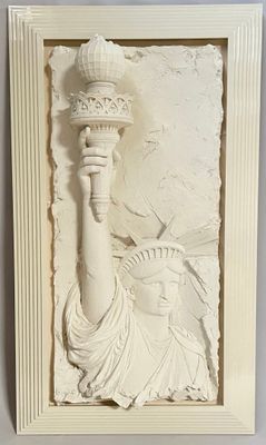 sculpture of statue of liberty holding a torch in her hand