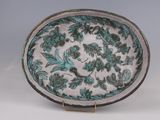 l'image d'une assiette ornée d'un motif floral