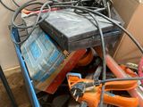 a pile of electrical equipment that is sitting on the floor