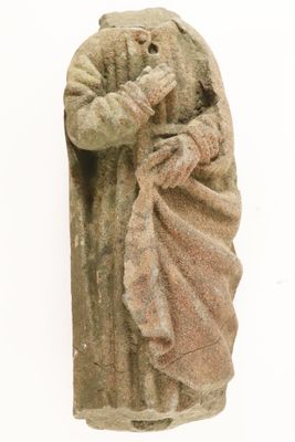a statue of a man holding a baby in his arms