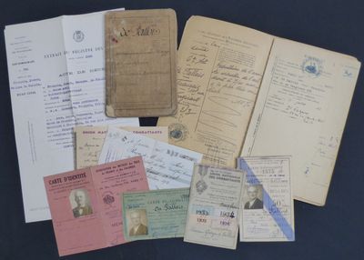 some old papers are sitting on top of a black table