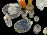 a lot of glass items that are on a table