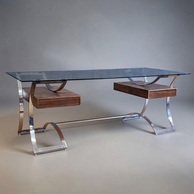 an image of a desk with a glass top and metal legs