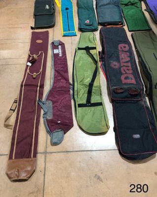 many different types of luggage sitting on the floor