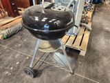 an image of a barbecue grill in a garage