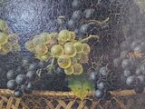 painting of a basket of grapes and grapes on a table