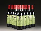 six bottles of red wine are lined up in a row