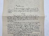 a piece of paper with writing on it sitting on top of a table