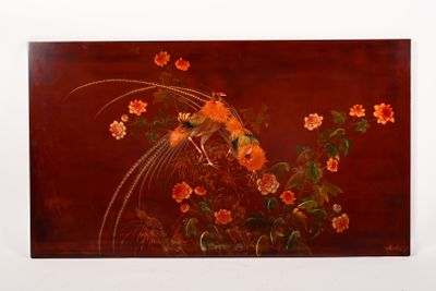 a picture of a painting of a bird and flowers on the wall