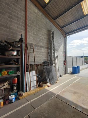 an image of a garage with a lot of stuff in it