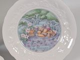 a plate with a picture of a teddy bear on it