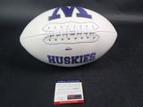 an image of a white and blue football with the words huskes on it