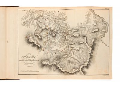 une vieille carte de l'île de Saint-Jean au milieu d'un livre