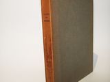 a book that is sitting on a white table