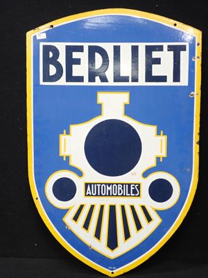 un gros plan d'un panneau bleu et jaune sur lequel figure un train