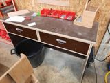 a workbench with a lot of tools on it