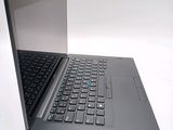 a laptop computer with a keyboard on a white surface