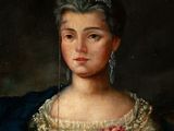 portrait of a woman in a white dress with a red flower in her hand