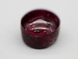 a small glass bowl with a liquid inside of it