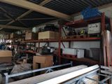 a room filled with lots of boxes and shelves