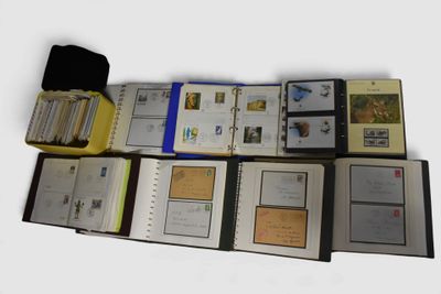 a lot of books that are sitting on a table
