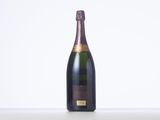 a close up of a bottle of champagne on a table