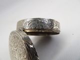 two rings that are sitting on top of each other