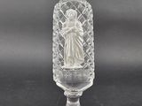 a clear glass vase with a statue of a woman inside of it