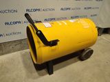 an image of a yellow barrel sitting on top of a cement floor