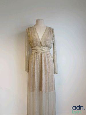an image of a dress on a mannequin stand