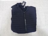 a close up of a black vest with a zipper on it