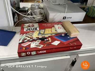 a red box with a game on it sitting on a counter
