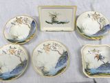 six pieces of porcelain dishes and trays on a table