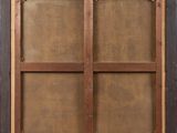 a close up of a window with a wooden frame on it