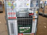 a metal cart with a sign on it in a warehouse