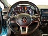 the interior of a car with a steering wheel and dashboard controls