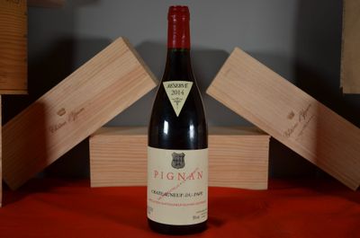 a bottle of wine that is sitting on a table