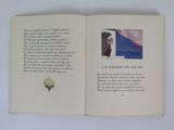 an open book with a picture of a woman in a red dress