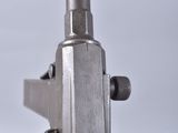 a close up of a gun that is being held by someone