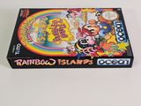 the box for the game rainbow island is sitting on a white surface
