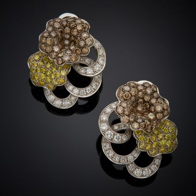 a pair of yellow and white diamond earrings