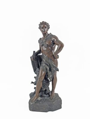 bronze statue of a woman with an umbrella on a rock